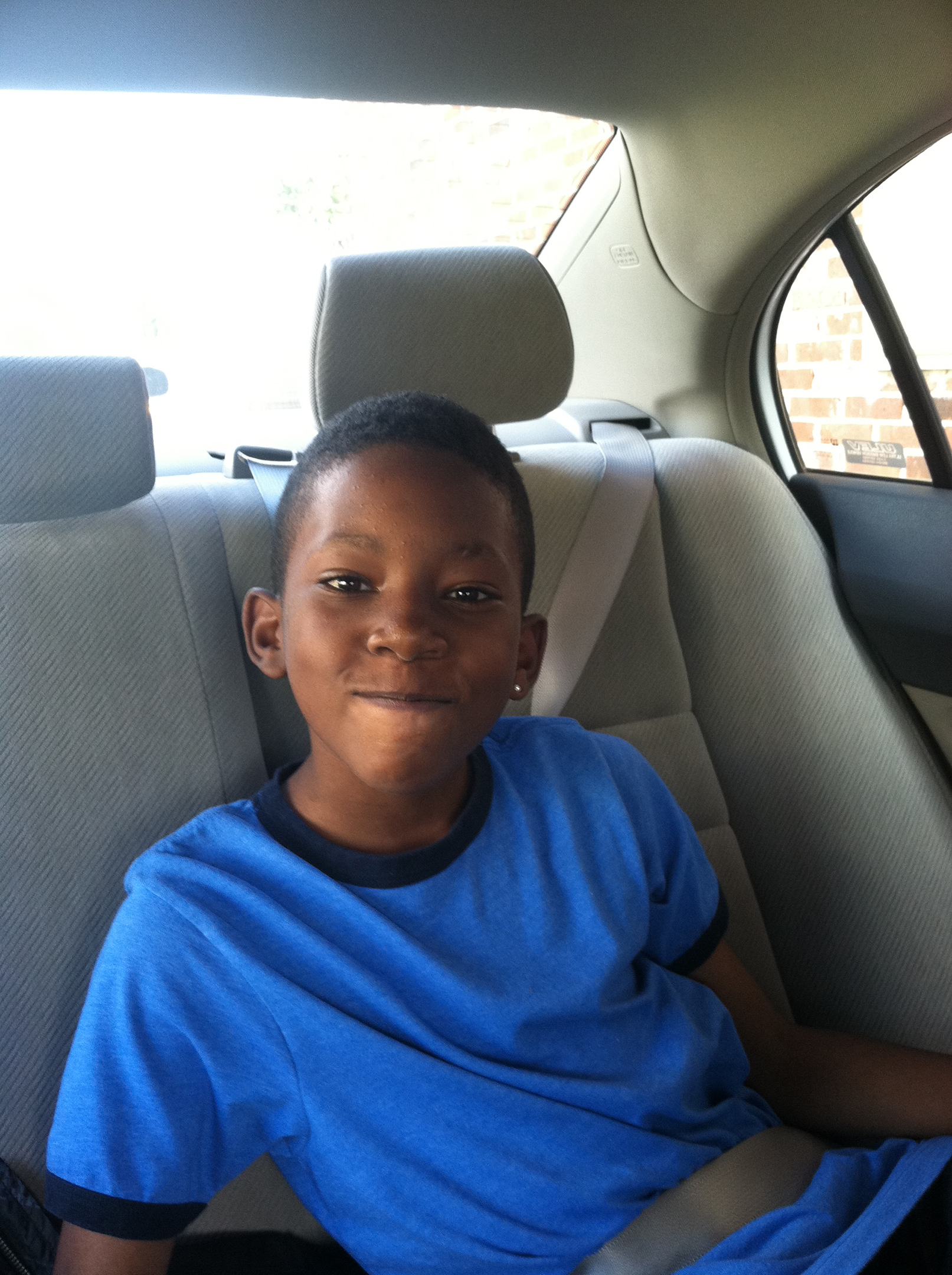 Ky'Ree riding in the back seat