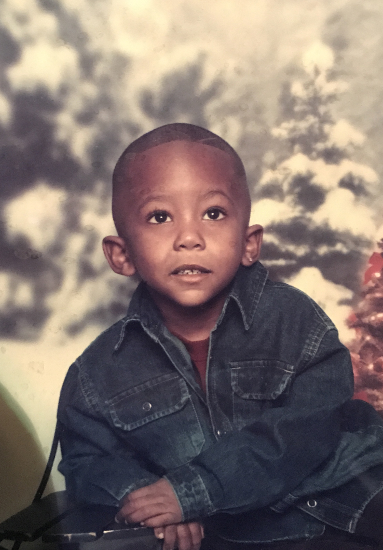 Ky'Baby Ky'Ree wearing a jean jacket