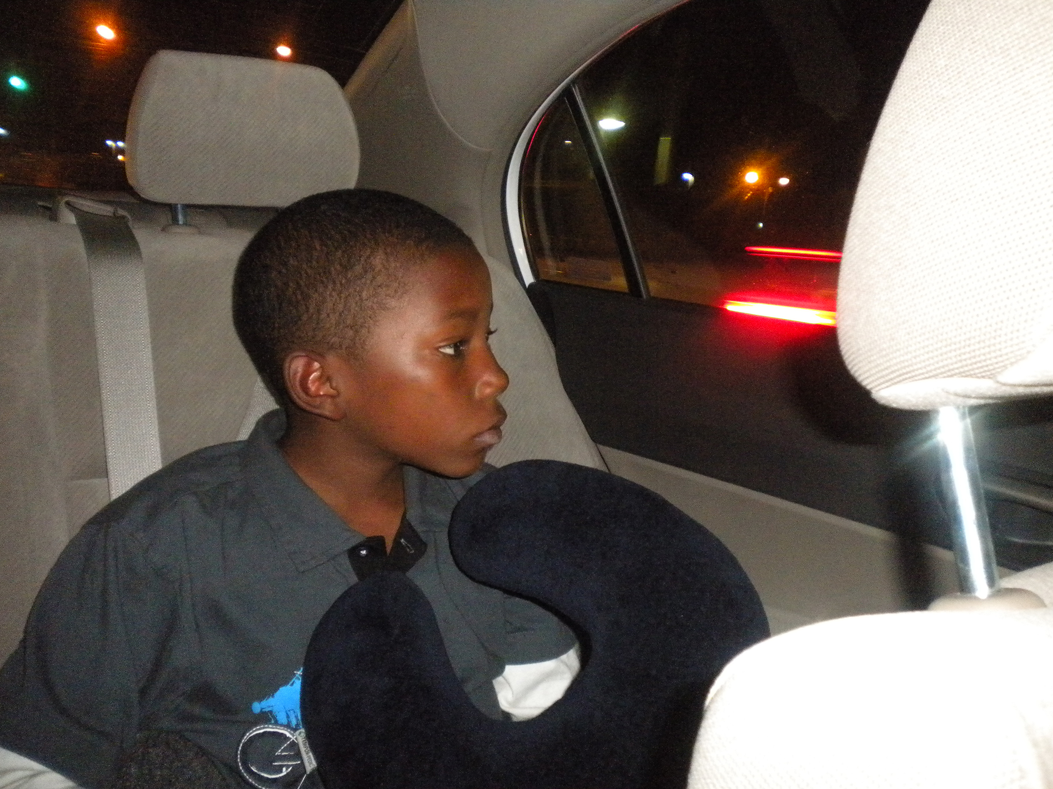 Ky'Ree staring out the window of the car