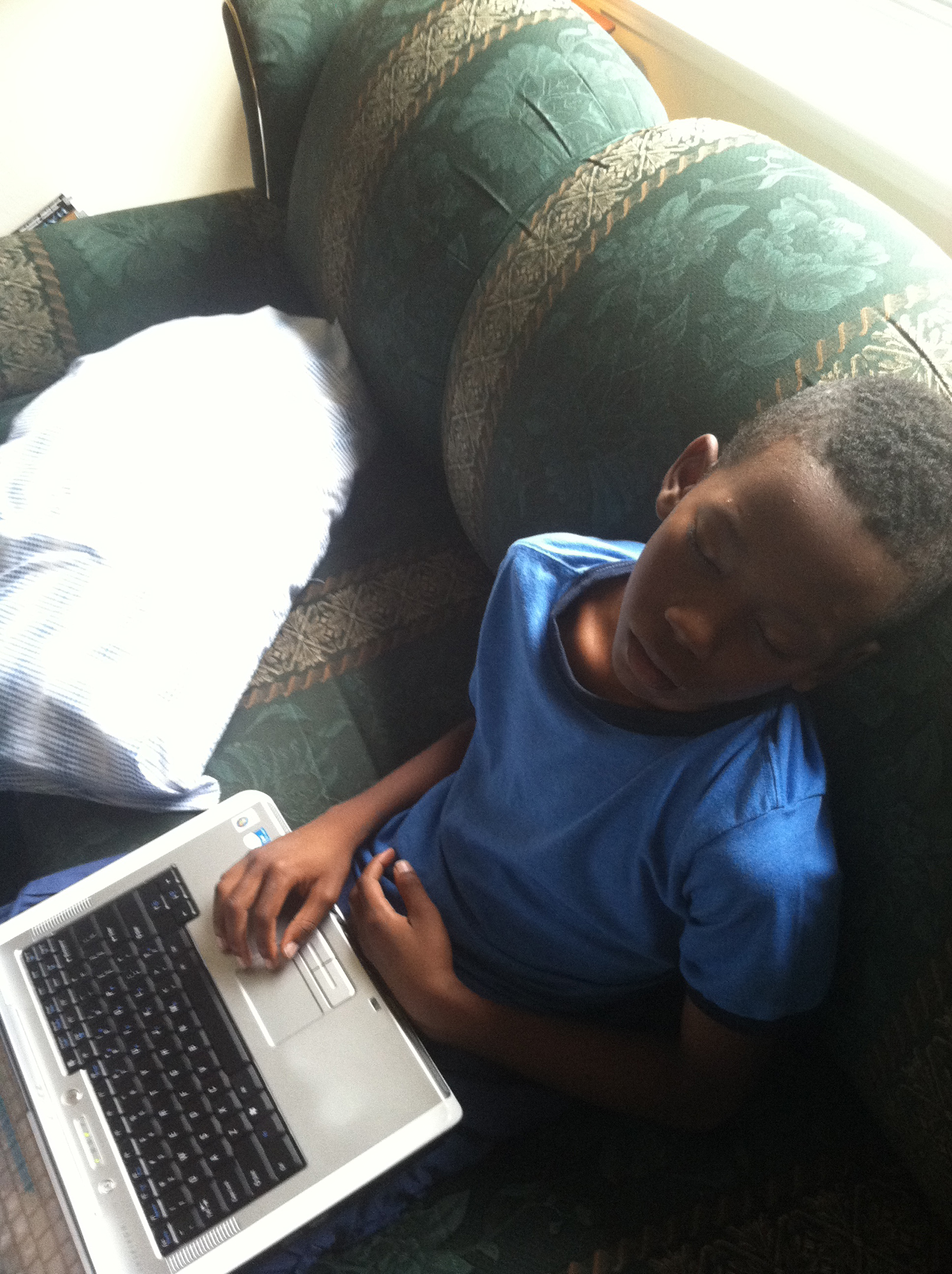 Ky'Ree falling asleep on his laptop